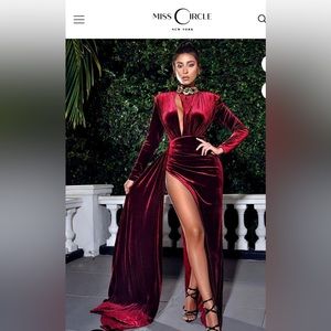 Burgundy velvet dress with gold details.